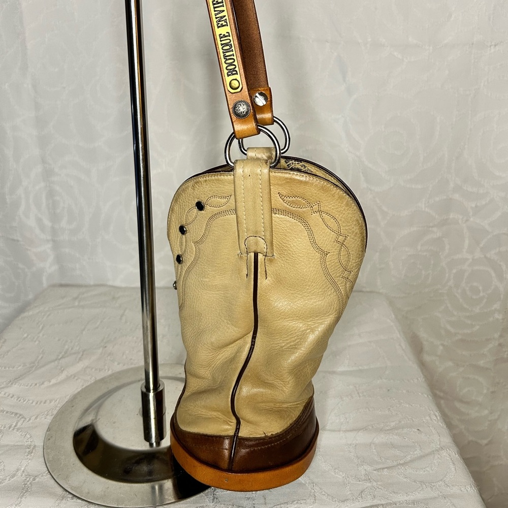 Vintage TONY LAMA Tan/Brown Leather Horse Hoof shaped Handbag w/ fur @ bottom.